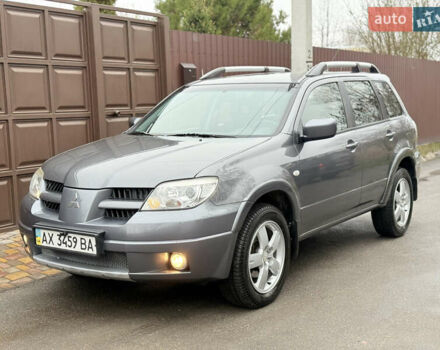 Серый Мицубиси Аутлендер, объемом двигателя 2.4 л и пробегом 240 тыс. км за 6900 $, фото 6 на Automoto.ua