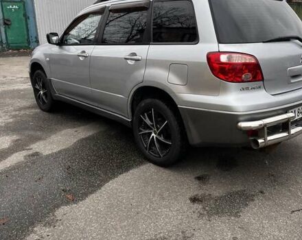 Сірий Міцубісі Аутлендер, об'ємом двигуна 2 л та пробігом 332 тис. км за 6200 $, фото 19 на Automoto.ua