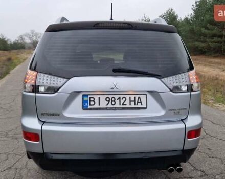 Серый Мицубиси Аутлендер, объемом двигателя 3 л и пробегом 197 тыс. км за 9500 $, фото 5 на Automoto.ua