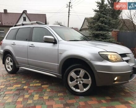 Сірий Міцубісі Аутлендер, об'ємом двигуна 2.4 л та пробігом 167 тис. км за 6400 $, фото 5 на Automoto.ua