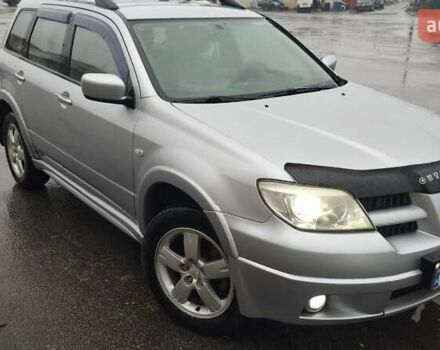 Серый Мицубиси Аутлендер, объемом двигателя 2.38 л и пробегом 204 тыс. км за 6100 $, фото 6 на Automoto.ua