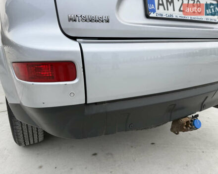 Серый Мицубиси Аутлендер, объемом двигателя 2 л и пробегом 299 тыс. км за 7750 $, фото 42 на Automoto.ua