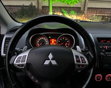 Серый Мицубиси Аутлендер, объемом двигателя 3 л и пробегом 129 тыс. км за 10500 $, фото 15 на Automoto.ua