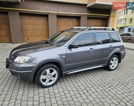 Сірий Міцубісі Аутлендер, об'ємом двигуна 2.38 л та пробігом 267 тис. км за 6300 $, фото 18 на Automoto.ua