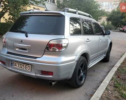 Сірий Міцубісі Аутлендер, об'ємом двигуна 2.4 л та пробігом 260 тис. км за 7300 $, фото 5 на Automoto.ua