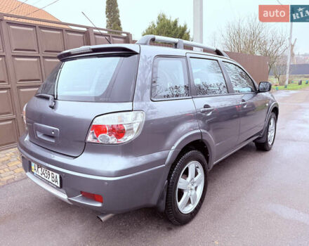 Серый Мицубиси Аутлендер, объемом двигателя 2.4 л и пробегом 240 тыс. км за 6900 $, фото 65 на Automoto.ua