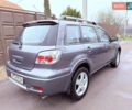 Серый Мицубиси Аутлендер, объемом двигателя 2.4 л и пробегом 240 тыс. км за 6900 $, фото 65 на Automoto.ua