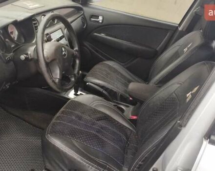 Серый Мицубиси Аутлендер, объемом двигателя 2.38 л и пробегом 204 тыс. км за 6100 $, фото 8 на Automoto.ua