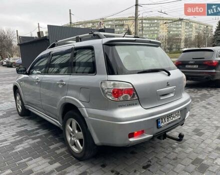 Серый Мицубиси Аутлендер, объемом двигателя 2.38 л и пробегом 280 тыс. км за 5800 $, фото 5 на Automoto.ua