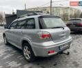 Серый Мицубиси Аутлендер, объемом двигателя 2.38 л и пробегом 280 тыс. км за 5800 $, фото 5 на Automoto.ua