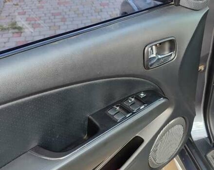 Серый Мицубиси Аутлендер, объемом двигателя 2.38 л и пробегом 189 тыс. км за 7600 $, фото 9 на Automoto.ua