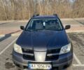 Сірий Міцубісі Аутлендер, об'ємом двигуна 2 л та пробігом 240 тис. км за 6500 $, фото 1 на Automoto.ua