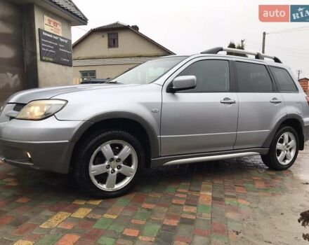 Сірий Міцубісі Аутлендер, об'ємом двигуна 2.4 л та пробігом 167 тис. км за 6400 $, фото 1 на Automoto.ua
