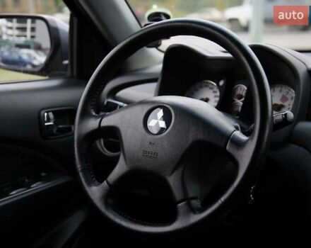 Серый Мицубиси Аутлендер, объемом двигателя 0 л и пробегом 240 тыс. км за 7200 $, фото 14 на Automoto.ua