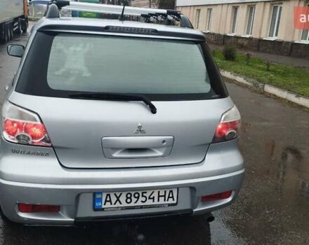 Серый Мицубиси Аутлендер, объемом двигателя 2.38 л и пробегом 204 тыс. км за 6100 $, фото 3 на Automoto.ua