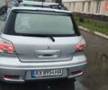 Серый Мицубиси Аутлендер, объемом двигателя 2.38 л и пробегом 204 тыс. км за 6100 $, фото 3 на Automoto.ua