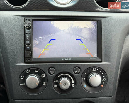 Серый Мицубиси Аутлендер, объемом двигателя 2.4 л и пробегом 240 тыс. км за 6900 $, фото 13 на Automoto.ua