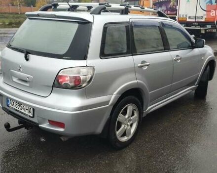 Серый Мицубиси Аутлендер, объемом двигателя 2.38 л и пробегом 204 тыс. км за 6100 $, фото 4 на Automoto.ua