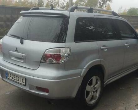 Сірий Міцубісі Аутлендер, об'ємом двигуна 2.38 л та пробігом 200 тис. км за 6550 $, фото 3 на Automoto.ua