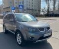 Серый Мицубиси Аутлендер, объемом двигателя 3 л и пробегом 260 тыс. км за 9299 $, фото 1 на Automoto.ua