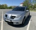 Серый Мицубиси Аутлендер, объемом двигателя 2.4 л и пробегом 176 тыс. км за 7350 $, фото 1 на Automoto.ua