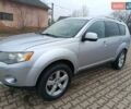 Серый Мицубиси Аутлендер, объемом двигателя 2 л и пробегом 332 тыс. км за 7650 $, фото 1 на Automoto.ua