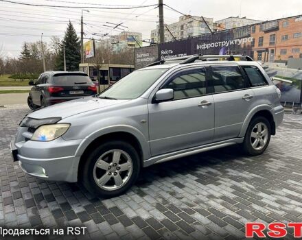 Серый Мицубиси Аутлендер, объемом двигателя 2.4 л и пробегом 280 тыс. км за 5800 $, фото 2 на Automoto.ua