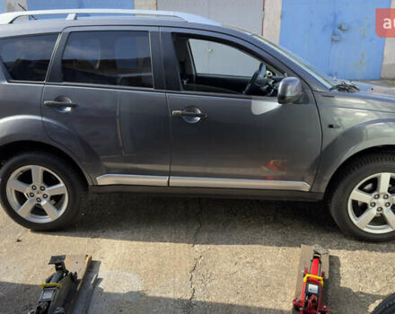 Серый Мицубиси Аутлендер, объемом двигателя 1.97 л и пробегом 260 тыс. км за 10900 $, фото 19 на Automoto.ua