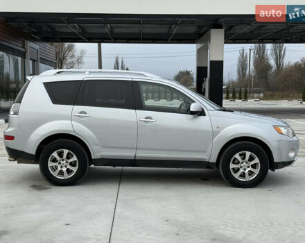 Серый Мицубиси Аутлендер, объемом двигателя 2 л и пробегом 299 тыс. км за 7750 $, фото 5 на Automoto.ua
