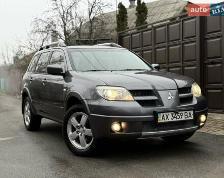 Серый Мицубиси Аутлендер, объемом двигателя 2.4 л и пробегом 240 тыс. км за 6900 $, фото 38 на Automoto.ua