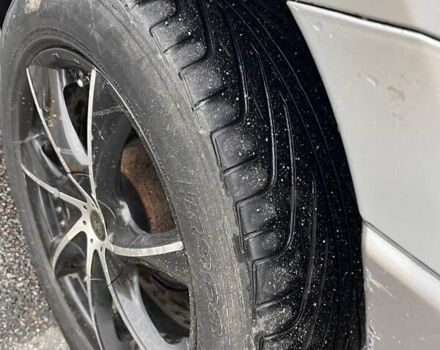 Сірий Міцубісі Аутлендер, об'ємом двигуна 2 л та пробігом 332 тис. км за 6200 $, фото 9 на Automoto.ua