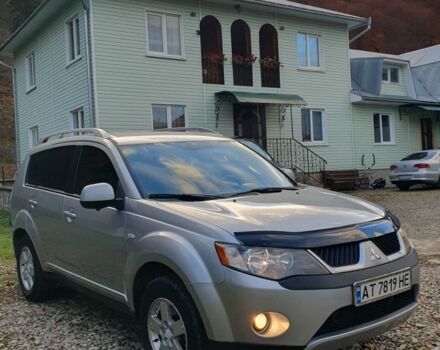 Серый Мицубиси Аутлендер, объемом двигателя 2 л и пробегом 320 тыс. км за 7500 $, фото 2 на Automoto.ua
