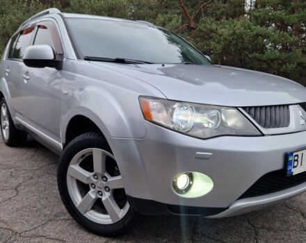 Серый Мицубиси Аутлендер, объемом двигателя 3 л и пробегом 197 тыс. км за 9500 $, фото 2 на Automoto.ua