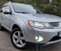 Серый Мицубиси Аутлендер, объемом двигателя 3 л и пробегом 197 тыс. км за 9500 $, фото 2 на Automoto.ua