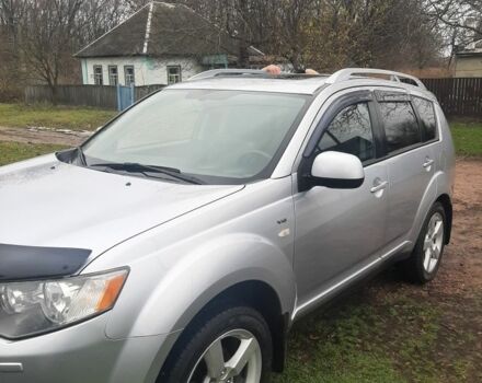 Серый Мицубиси Аутлендер, объемом двигателя 3 л и пробегом 183 тыс. км за 9200 $, фото 3 на Automoto.ua