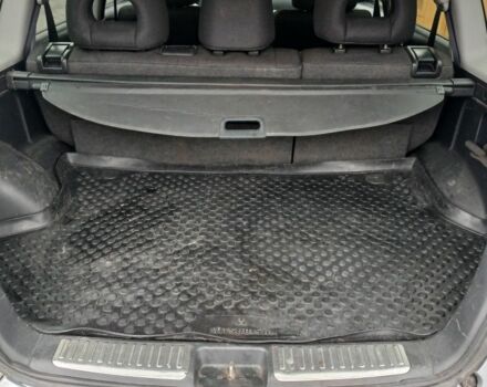 Серый Мицубиси Аутлендер, объемом двигателя 2.4 л и пробегом 300 тыс. км за 5900 $, фото 4 на Automoto.ua