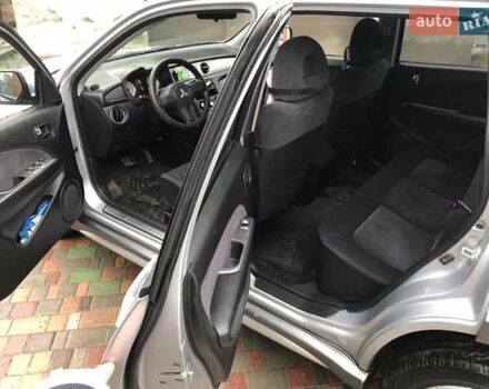 Сірий Міцубісі Аутлендер, об'ємом двигуна 2.4 л та пробігом 167 тис. км за 6400 $, фото 6 на Automoto.ua