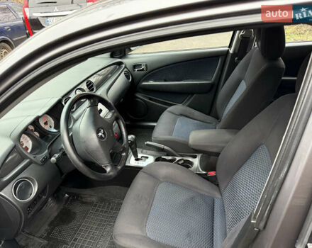 Серый Мицубиси Аутлендер, объемом двигателя 2.4 л и пробегом 240 тыс. км за 6900 $, фото 19 на Automoto.ua