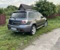 Сірий Міцубісі Аутлендер, об'ємом двигуна 2 л та пробігом 142 тис. км за 8600 $, фото 1 на Automoto.ua