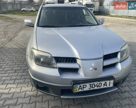 Сірий Міцубісі Аутлендер, об'ємом двигуна 2.4 л та пробігом 166 тис. км за 6700 $, фото 1 на Automoto.ua