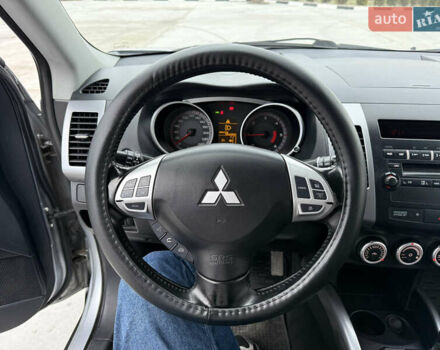 Серый Мицубиси Аутлендер, объемом двигателя 2 л и пробегом 299 тыс. км за 7750 $, фото 19 на Automoto.ua