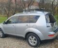 Серый Мицубиси Аутлендер, объемом двигателя 2 л и пробегом 320 тыс. км за 7500 $, фото 6 на Automoto.ua