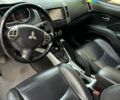 Серый Мицубиси Аутлендер, объемом двигателя 2 л и пробегом 220 тыс. км за 9100 $, фото 3 на Automoto.ua