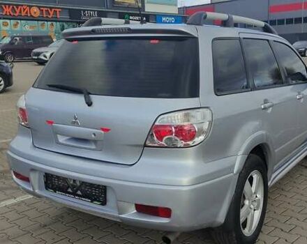 Сірий Міцубісі Аутлендер, об'ємом двигуна 2.4 л та пробігом 170 тис. км за 6400 $, фото 10 на Automoto.ua