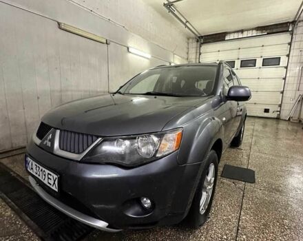 Серый Мицубиси Аутлендер, объемом двигателя 2.4 л и пробегом 190 тыс. км за 8000 $, фото 1 на Automoto.ua