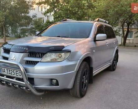 Сірий Міцубісі Аутлендер, об'ємом двигуна 2.4 л та пробігом 260 тис. км за 7300 $, фото 3 на Automoto.ua