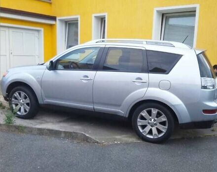 Серый Мицубиси Аутлендер, объемом двигателя 2.2 л и пробегом 207 тыс. км за 8000 $, фото 1 на Automoto.ua