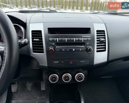 Серый Мицубиси Аутлендер, объемом двигателя 2 л и пробегом 299 тыс. км за 7750 $, фото 22 на Automoto.ua