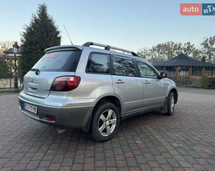 Серый Мицубиси Аутлендер, объемом двигателя 2 л и пробегом 415 тыс. км за 4699 $, фото 3 на Automoto.ua