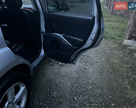 Серый Мицубиси Аутлендер, объемом двигателя 2.4 л и пробегом 236 тыс. км за 7600 $, фото 22 на Automoto.ua